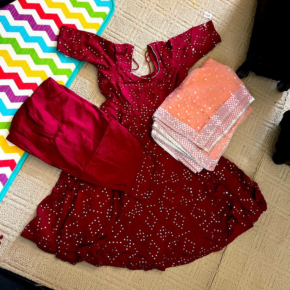 Brand new suit in maroon colour with mirror work with peech dupatta